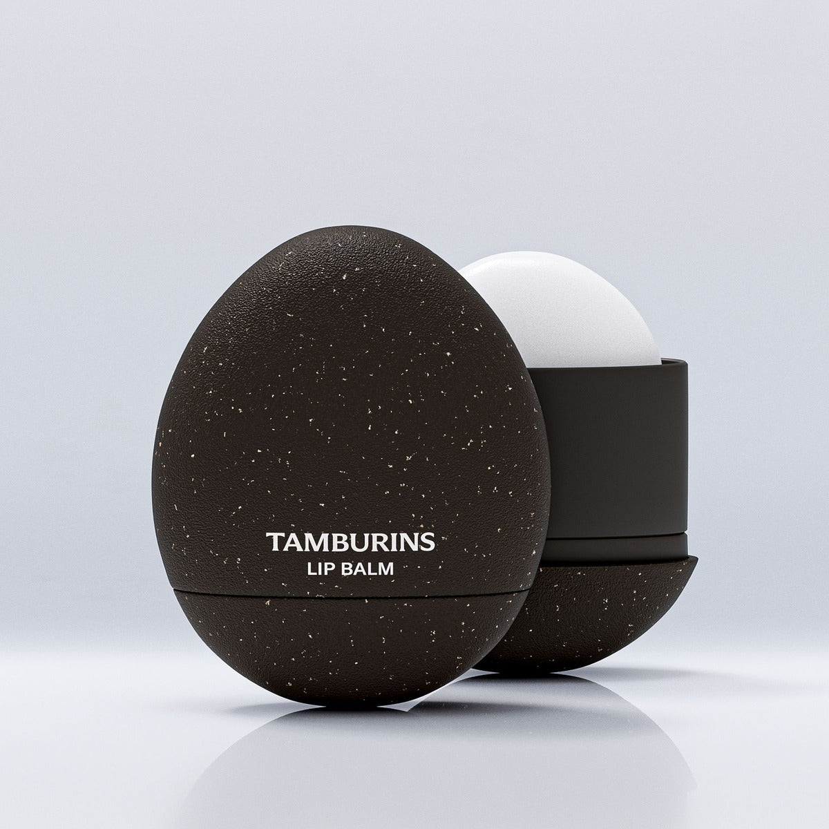 TAMBURINS Egg Lip Balm Woody Green 5g in its egg-shaped case